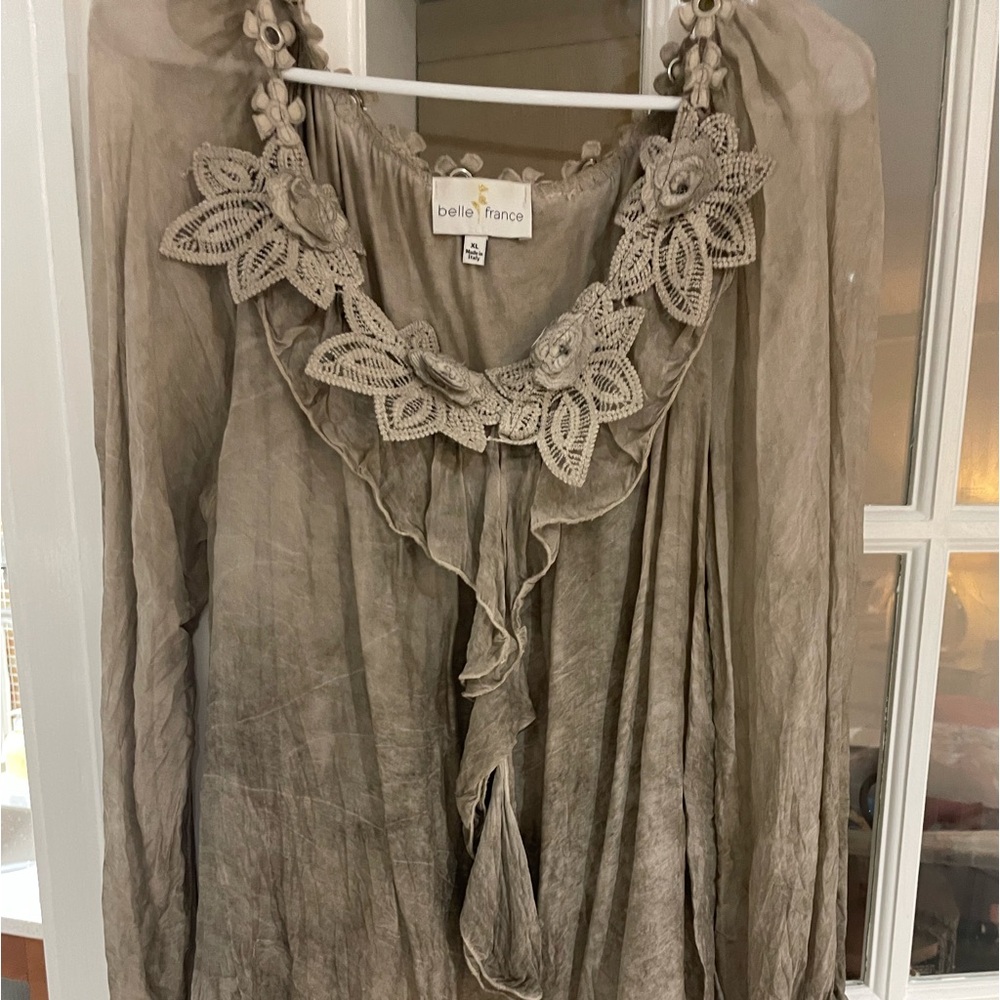 Ruffle silk blouse in light beige/gray tone. Dress up or down. Very versatile.